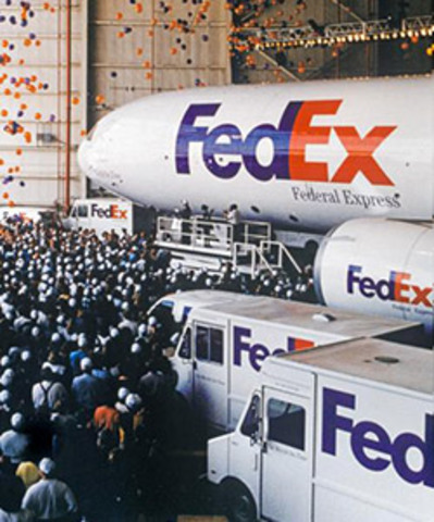 Parent company FDX is renamed "FedEx Corporation." Services are divided into companies that operate independently yet compete collectively: FedEx Express, FedEx Ground, FedEx Global Logistics, FedEx Custom Critical, and FedEx Services.
