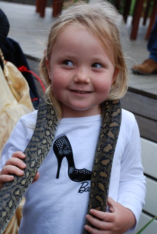 Holding a snake at Jessica's Bush Baby party