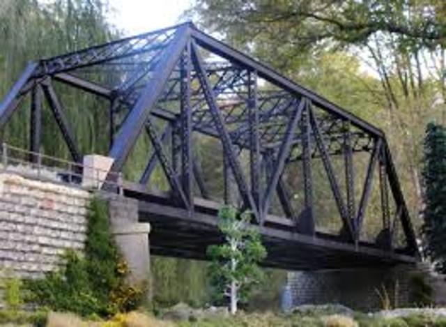 The first truss bridge