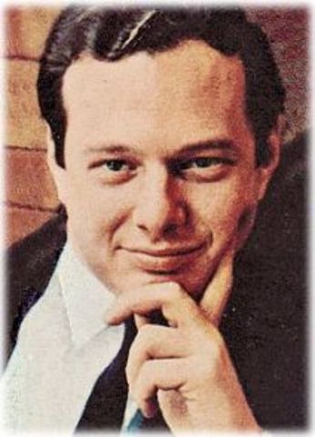 Manager Brian Epstein Listens to Group