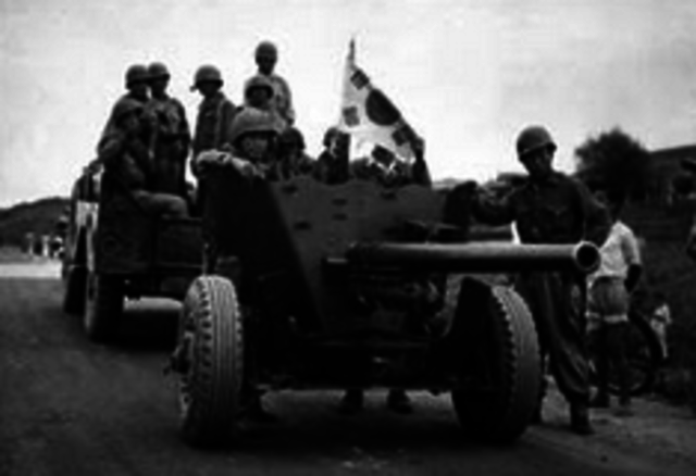 Korean War begins/ North Korean troops attack South Korea