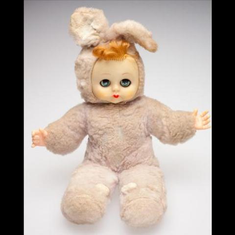 Doll with vinyl face and cloth body