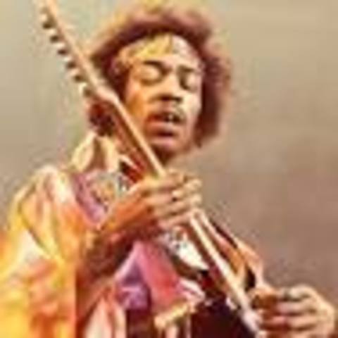 Jimi burns his guitar.