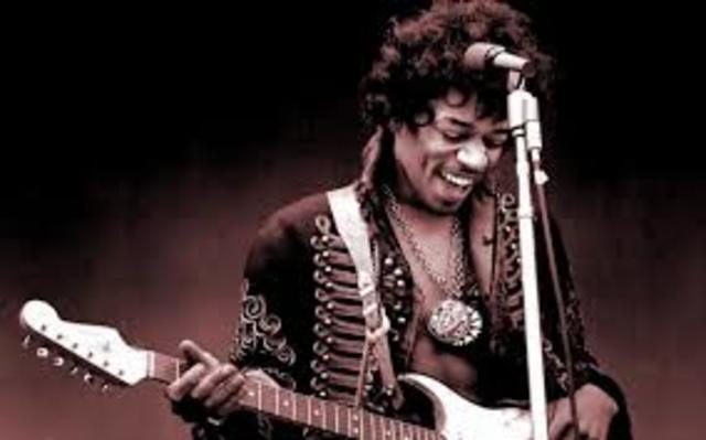 Jimi Hendrix performs at the Isle of Wight Festival in England.