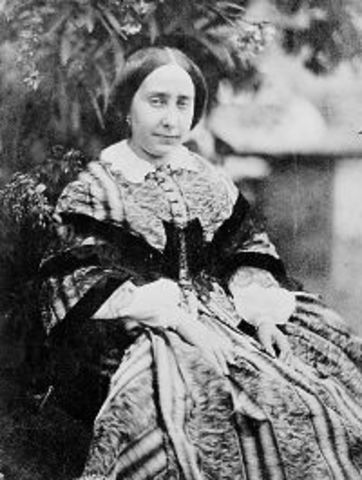 Primera mujer fotográfa.