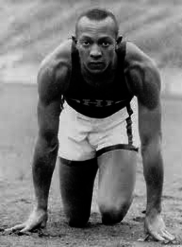 Jesse Owens wins 4 gold medals at Olympics in Germany