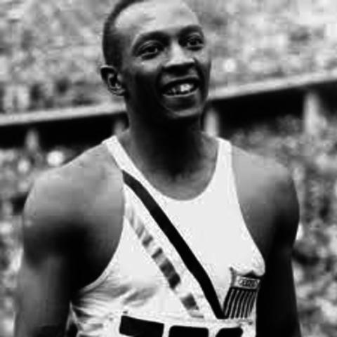 jesse owens wins four gold medals at olimpics in germany