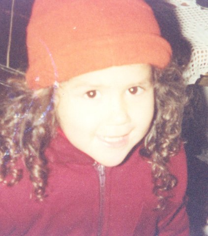 Yo amb els meus rinxols de petita.