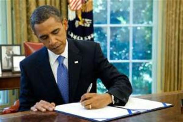 obama signs healthcare reform