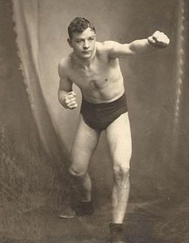 HART WINS HEAVYWEIGHT TITLE