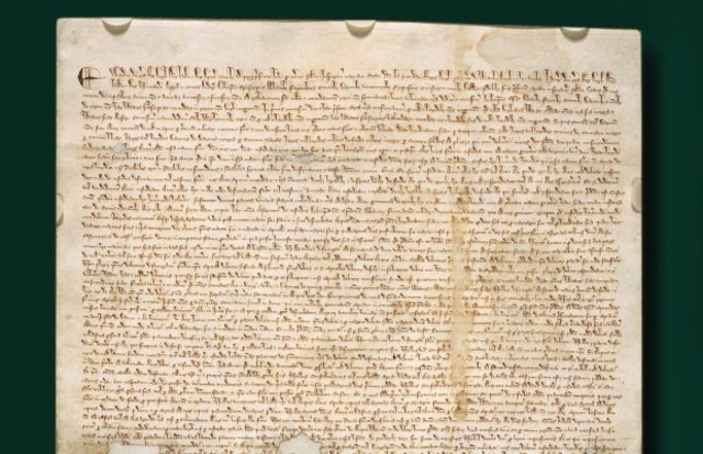 King John of England signs the Magna Carta. This document gave the people some rights and said the king was not above the law.