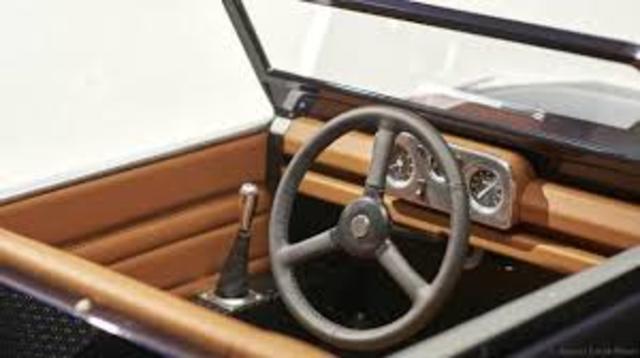 single foot pedal to operate four-wheel brakes