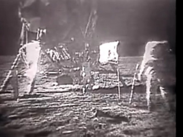 Armstrong and Aldrin walk on the Moon as part of Apollo 11 mission.