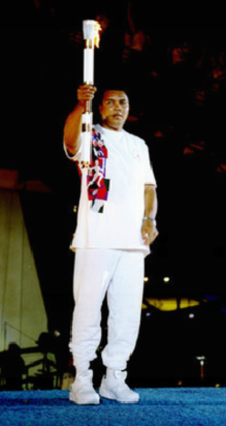 Muhammad Ali lights the flame at the 1996 Summer Olympics opening ceremony