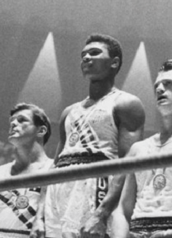 Muhammad Ali wins the gold medal in Summer Olympics