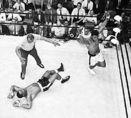 Muhammad Ali defeats Sony Liston in Heavyweight title