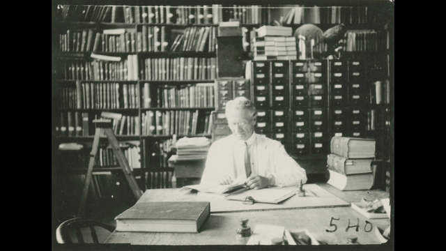 Junius Henderson in his office.