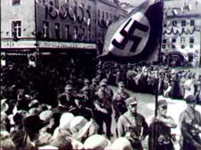 Holland surrenders to the Nazis.