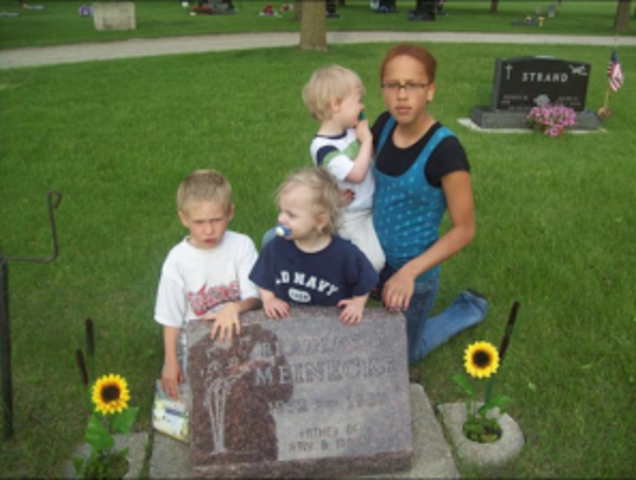 Us at my grandpa's grave