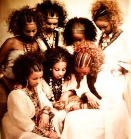 family gets a visit from two habesha women