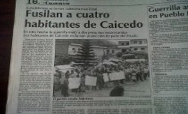 Ejecuciòn de Comerciantes en la plaza principal de Caicedo