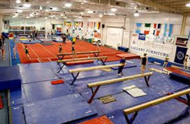 Opens the Karolyi Training Center in Houston, TX
