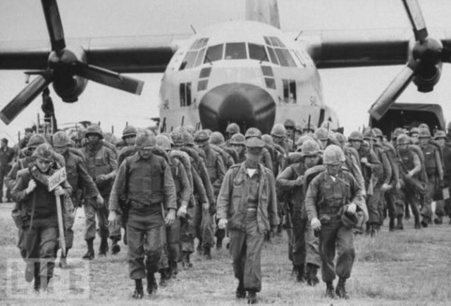 The first US combat forces land in South Vietnam.