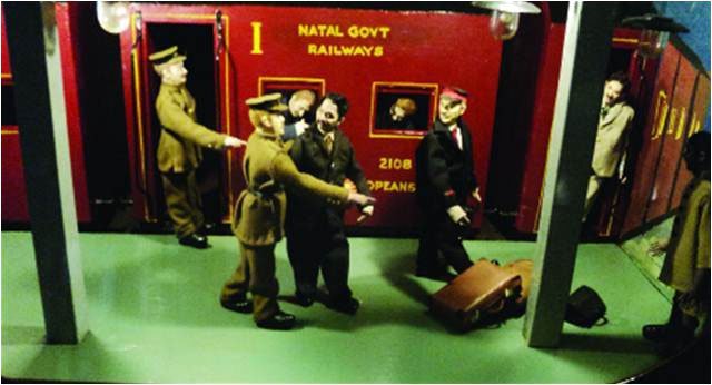 Gandhi is thrown off of a train in South Africa