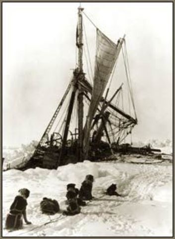 Shackleton and his crew watch the Endurance sink