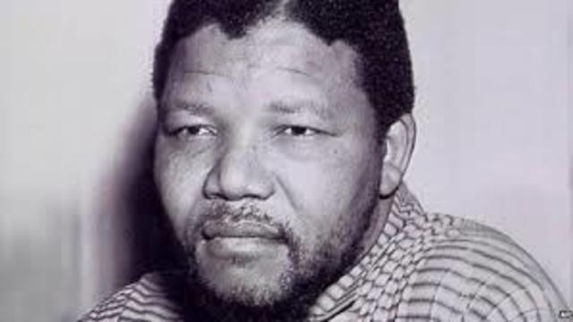 Nelson Mandela is arrested for treason.
