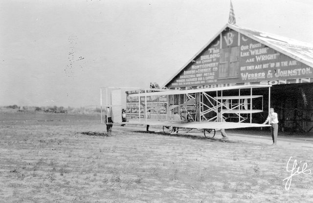 The Wright company starts a flight school