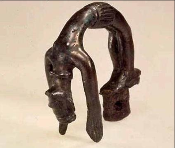 Statuetter af akrobatdanserinde