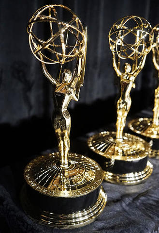 Jim Mckay gets awarded a emmy for a sports epcial