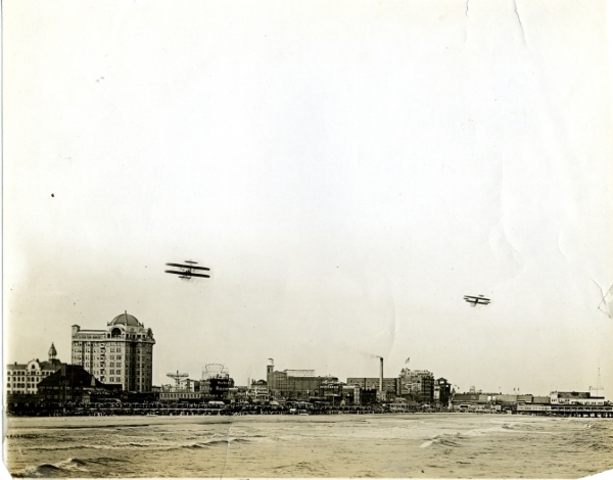 Day Five of the Airshow: Competitive Flight Begins; Curtiss Disappears