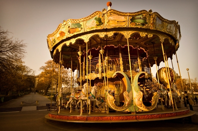 Holden watches Phoebe ride the carousel in the rain and begins to cry