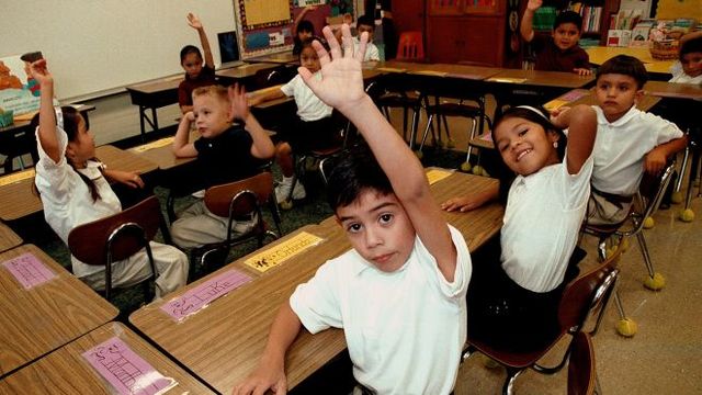 Lyndon Johnson signs the Immigration Act of 1965.