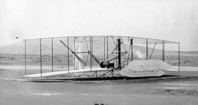 Wilbur and Orville Wright fly a gasoline-powered flying machine