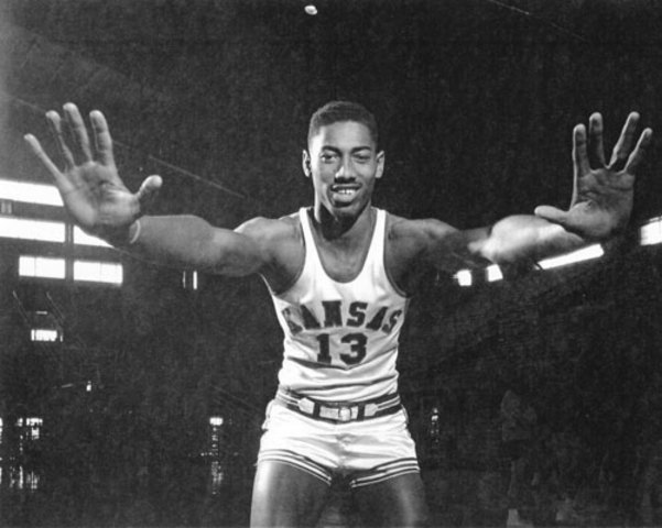 Wilt Chamberlain signs with Kansas Jayhawks