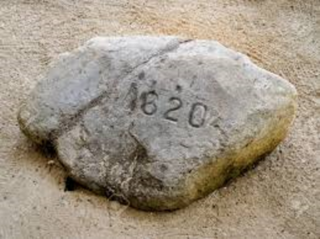 The Mayflower lands a Plymouth Rock, Massachusetts