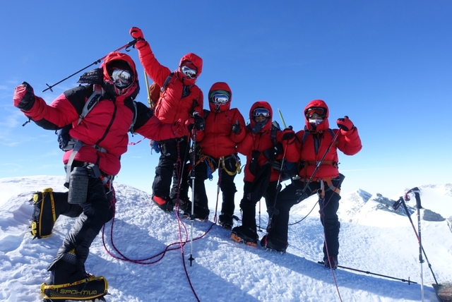 Mark and his peers reach the summit of the mountain in Nepal