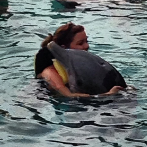 I went on a cruise for graduation and my parents surprised me with swimming with dolphins! (Something I always wanted to do!)