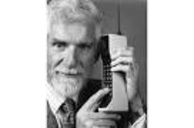 Motorola produced a handheld phone.