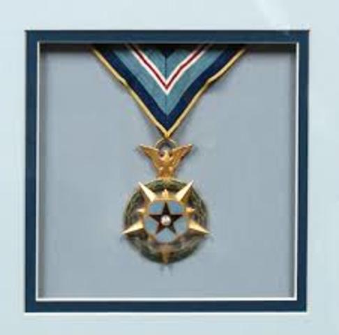 Neil is awarded for his efforts