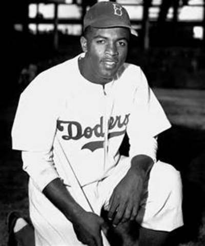 Jackie Robinson becomes the first black in a major league baseball team.