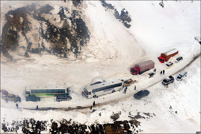 Afghan officials remove 150 bodies of people killed by avalanches.