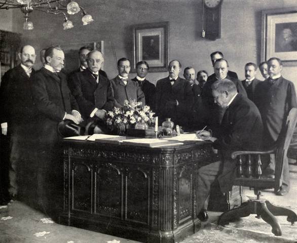 Treaty of Paris signed US annexes Puerto Rico, Guam, Philippines.