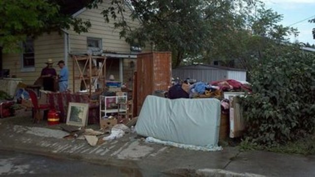 "Mother had begun moving all of our furniture into the yard." pg. 371