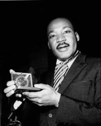 Martin Luther King receives his bachelor of arts degree