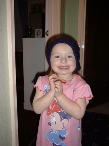 Me acting like a 'badman' with my brothers hat on.