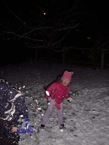 Me being pelted by snow by my brother. My first site of snow!